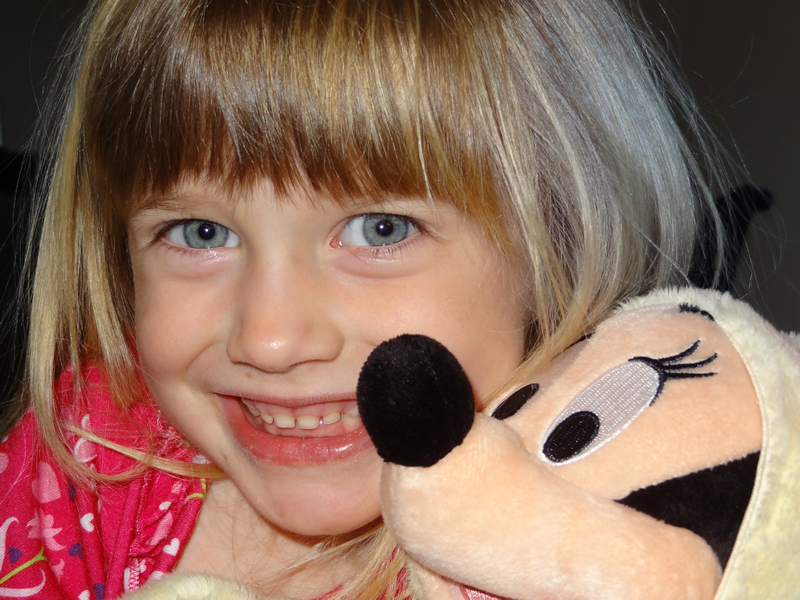 Mia Moore and her Easter Bunny Minnie Mouse doll